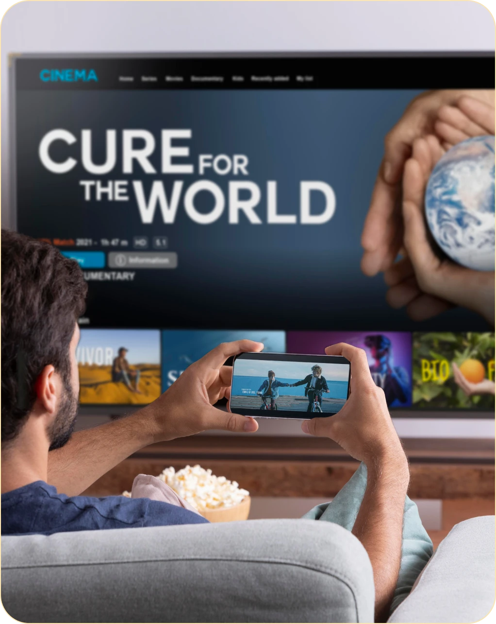 Addressable Streaming Tv Solutions A Man Sitting On A Couch Watching A Movie