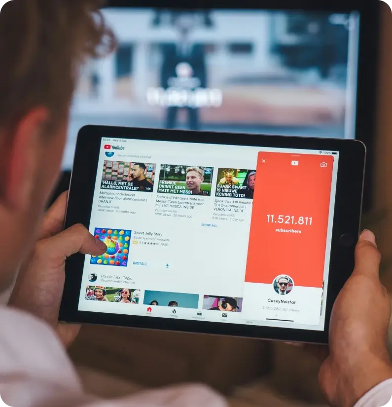 A Person Holding A Tablet