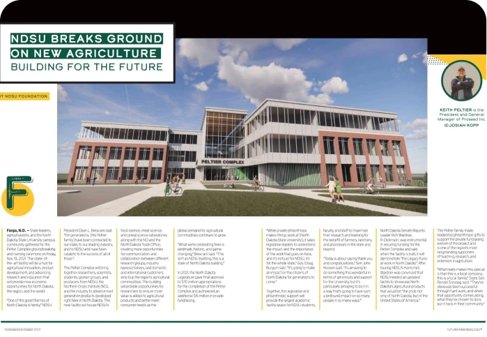 a large building with a lawn and people on it