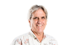 A Man Smiling With A Black Background