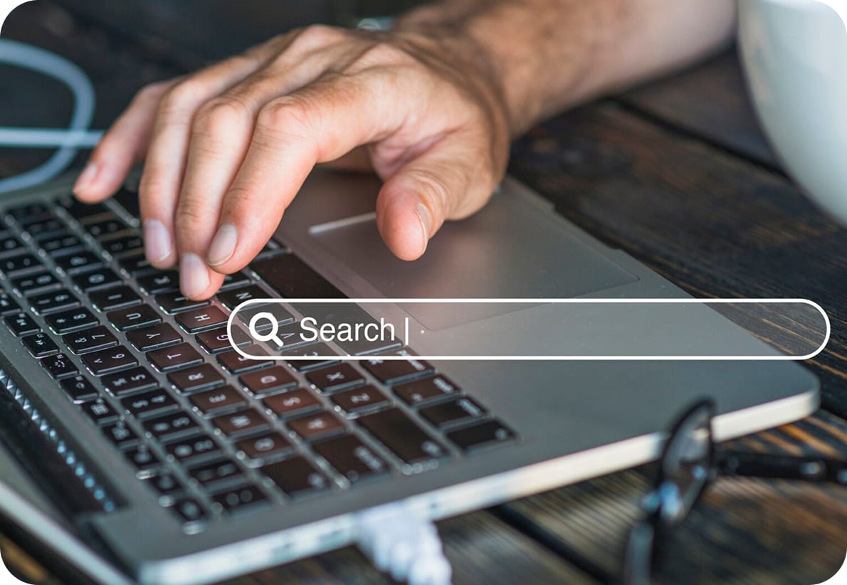 A Hand On A Laptop Keyboard