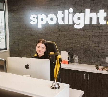 A Woman Sitting At A Computer