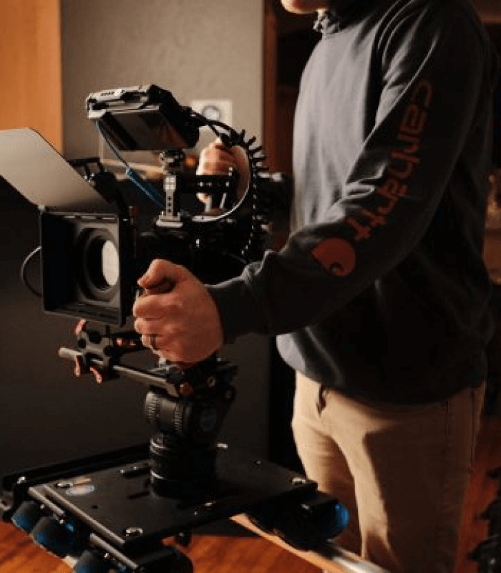 Person Holding A Camera Rig