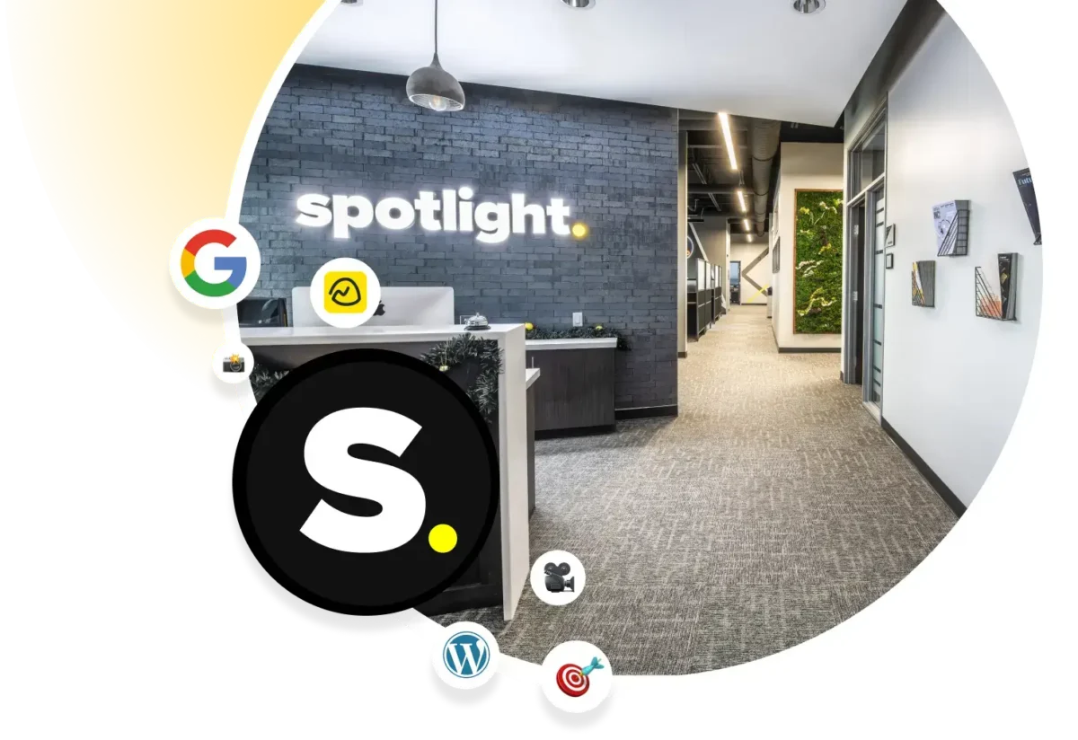 Modern Office Lobby With Illuminated “Spotlight” Sign, Curved White Frame, Long Hallway, And Floating Icons Including A Large S Logo, Google, Wordpress, Video Camera, And Target.