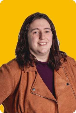 A Person With Long Hair Smiling