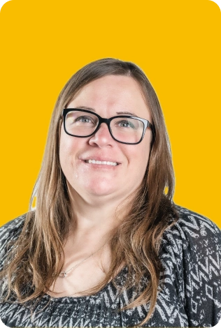 A Woman With Glasses Smiling